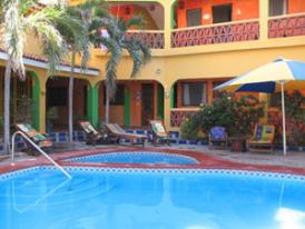 Mexico Resorts - Enjoy ambiance of the tropical gardens and pool at El Palmar, your Mexico Resort.
